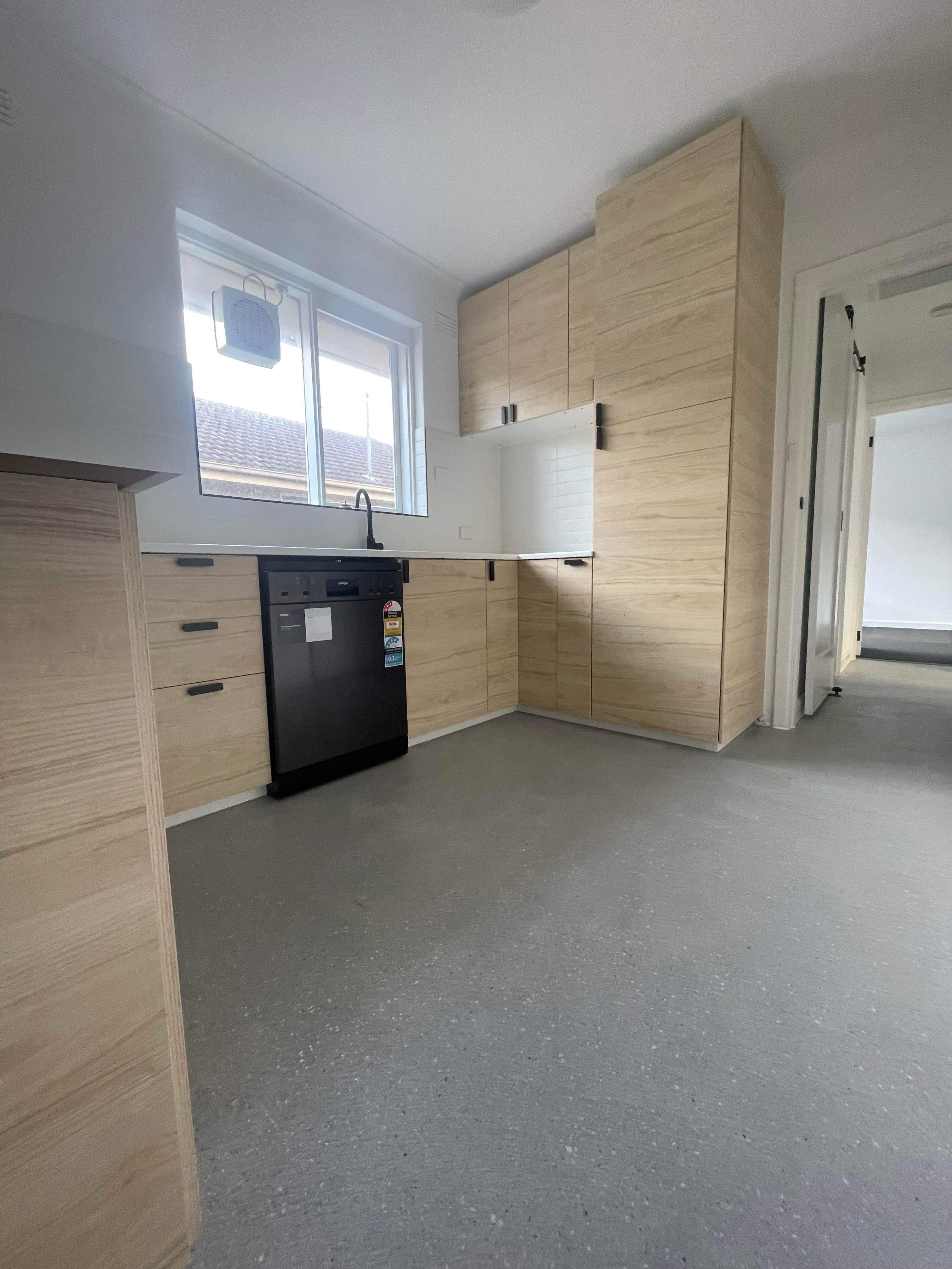 Residential epoxy flooring, kitchen installation Melbourne