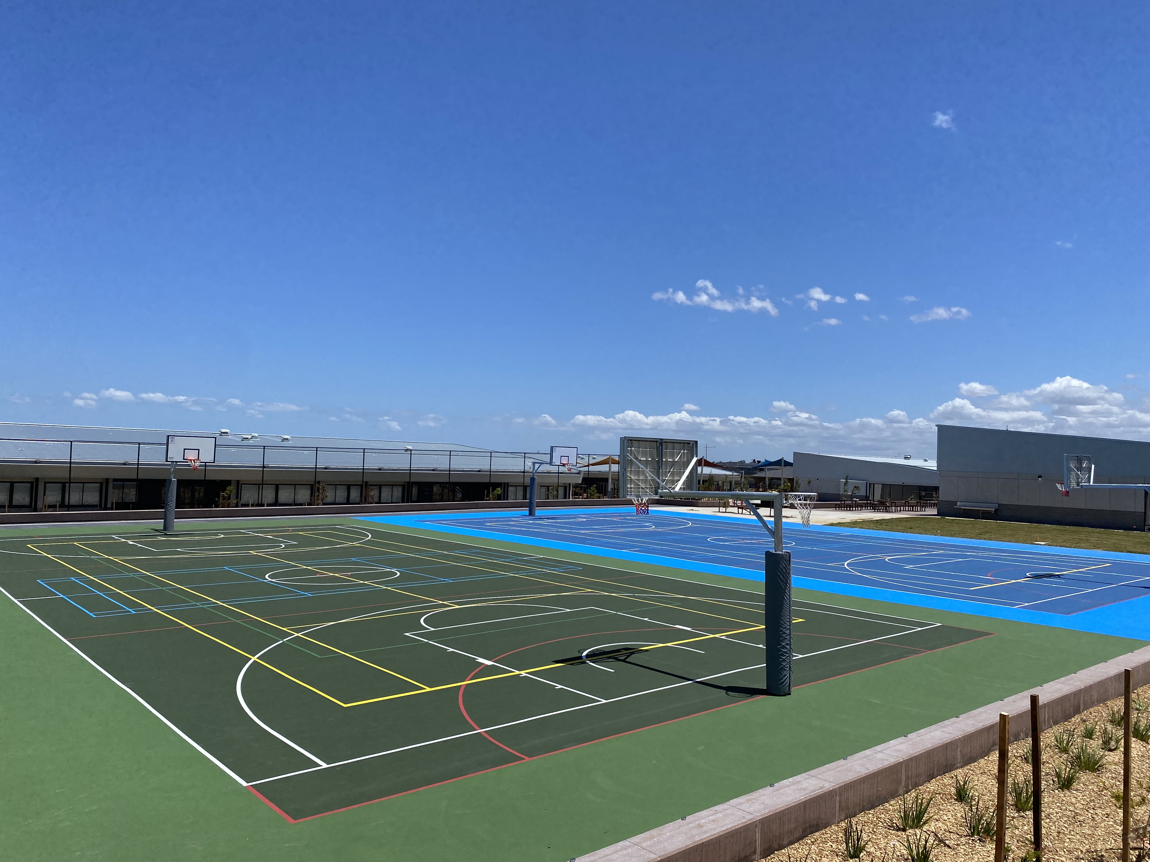 Outdoor sports court concrete resurfacing